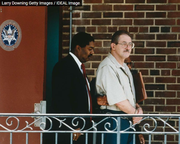 photo showing Aldrich Ames leaving the courthouse after receiving a life sentence (credit: Getty images)