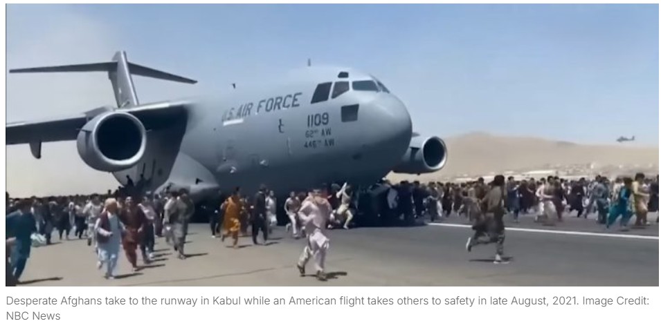 Desperate Afghans take to the runway in Kabul August, 2021 credit: NBC News
